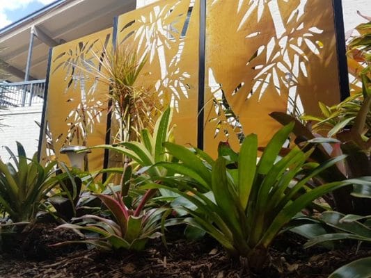 Landscaping Brisbane North- decorative screens with bromeliad garden