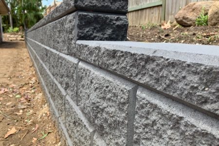 Close up image of heron retaining wall in north brisbane landscaping project