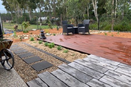 Landscaping Brisbane - Native garden with merbau decking and dry riverbed